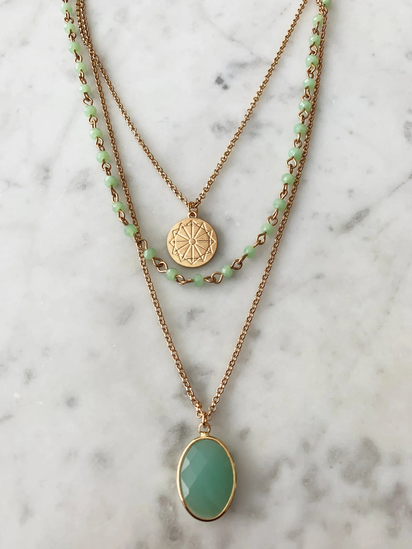 Green Chalcedony Facet Stone Multi-Layered Pendant Necklace with background
