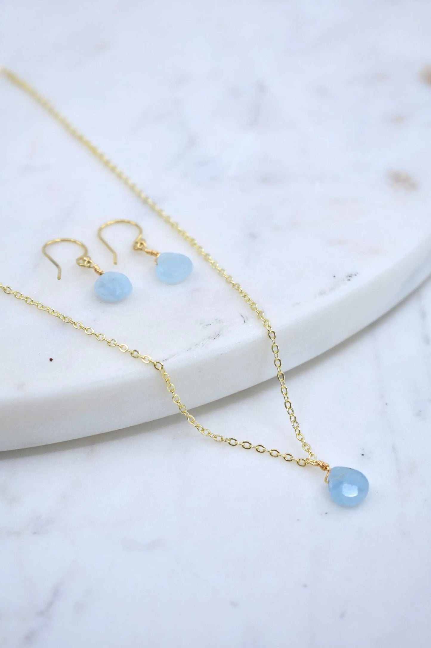 The Bailey Set in Aquamarine and Vermeil with background