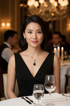 Sky Blue Topaz and Pear Cut Black Onyx Dangle Drop Necklace